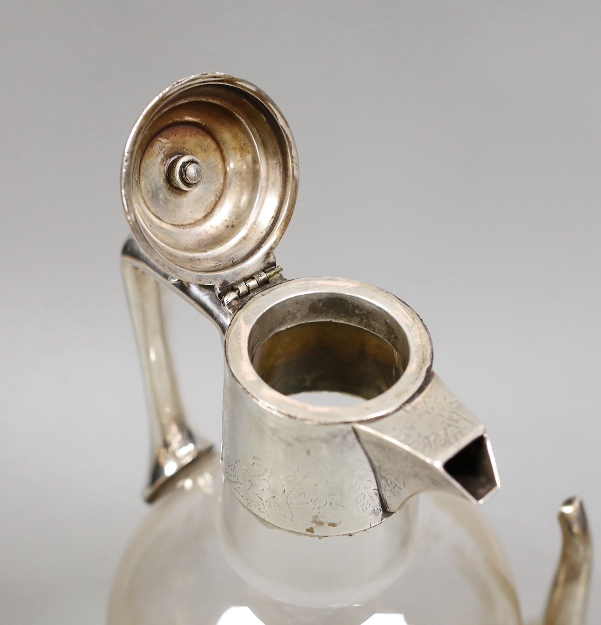 A George III silver wine funnel, James Mince, London, 1794, 12.5cm, together with a silver plate mounted glass claret jug.